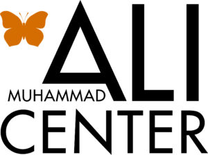 Logo for the Muhammad Ali Center featuring a stylized orange butterfly above the word "ALI" and the text "MUHAMMAD ALI CENTER" in bold black letters.