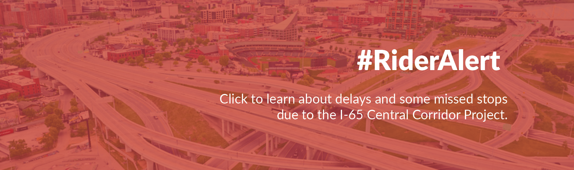 Aerial view of highway interchange with text: 